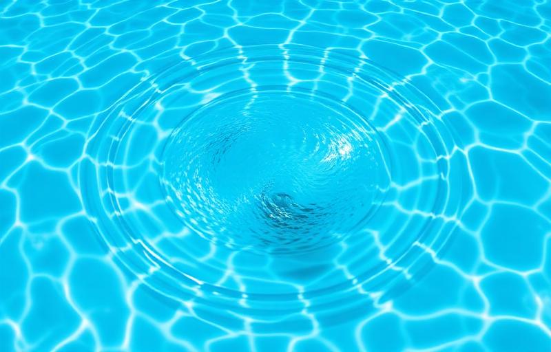 Crystal clear pool water with strong return jet circulation